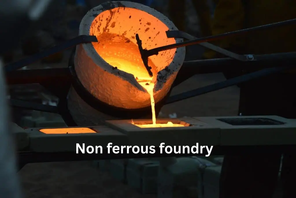 Non-ferrous foundry — molten metal poured from a crucible into a casting mould